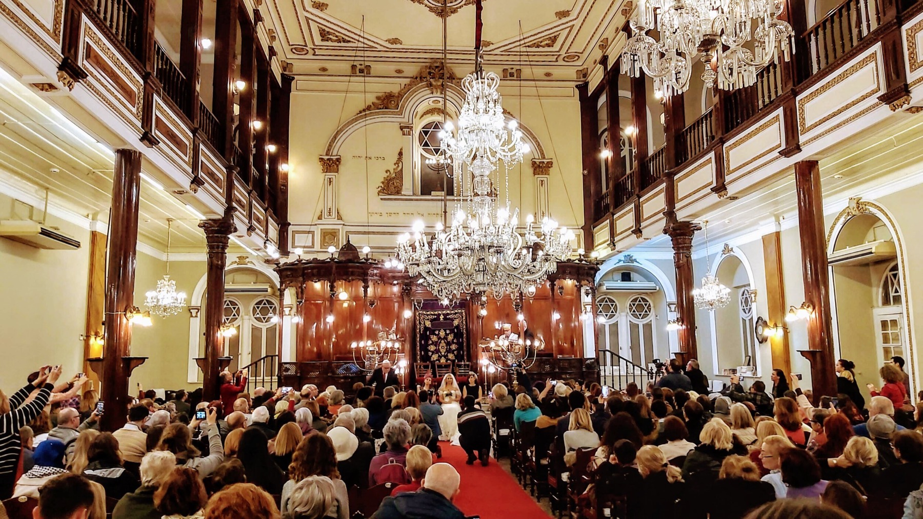 A festival concert gathering inside Bet Israel Synagogue.